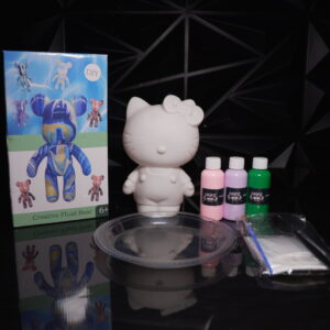DIY fluid art kit with Hello Kitty figure, paints, and accessories. Creative craft project. The Leading Paint & Pour Kit — Only from Dripz Bar Creations.