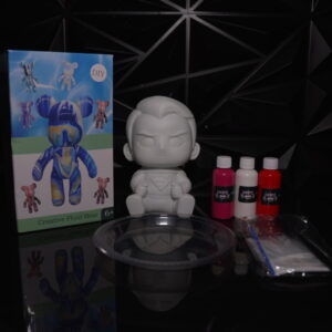 DIY Superman figure paint kit with paint, brush, and fluid bear box. The Leading Paint & Pour Kit — Only from Dripz Bar Creations.