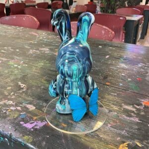 Blue punk rabbit with blue butterfly